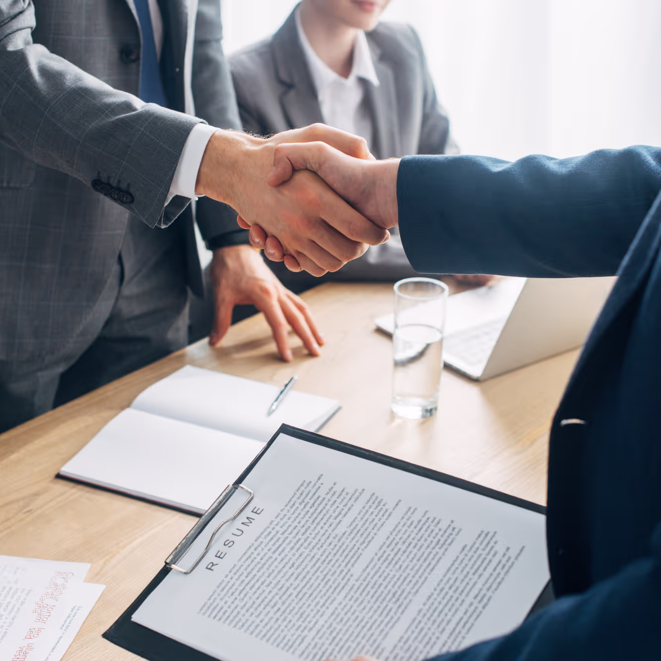 Executives shaking hands